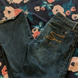 Slight distressed size 30 jeans flare
